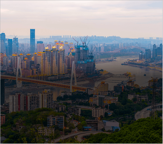 City skyline with river and bridge
