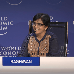 Shanti Raghavan seated at a panel discussion during a World Economic Forum event.