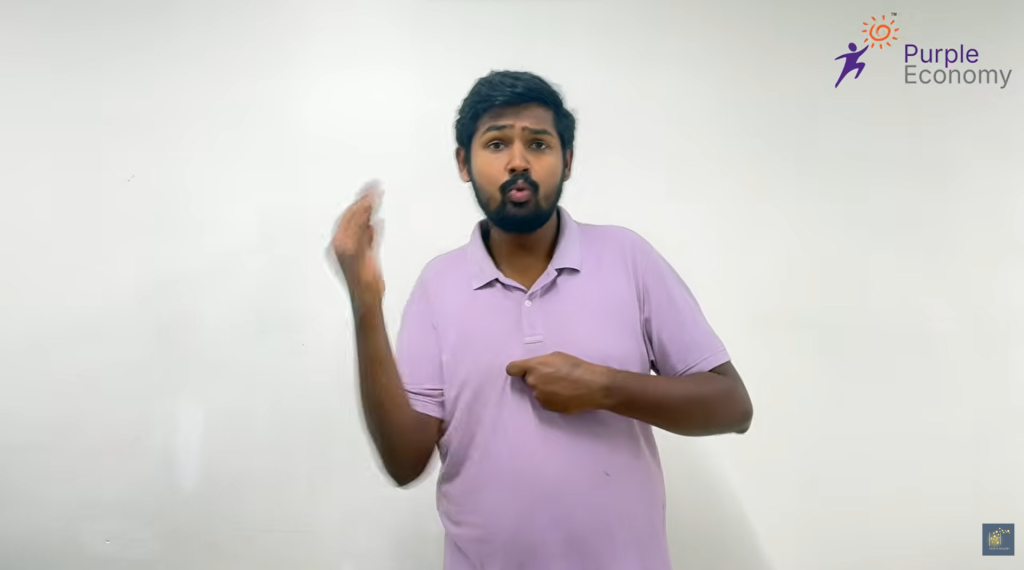 Person communicating using sign language with Purple Economy logo.